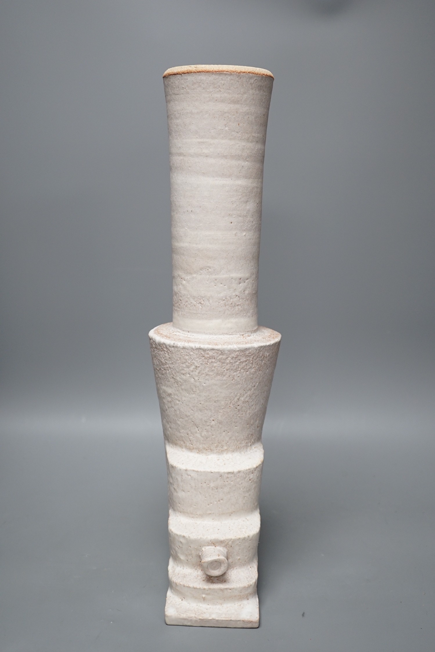 An unusual white glazed Studio pottery vase, 44cms high